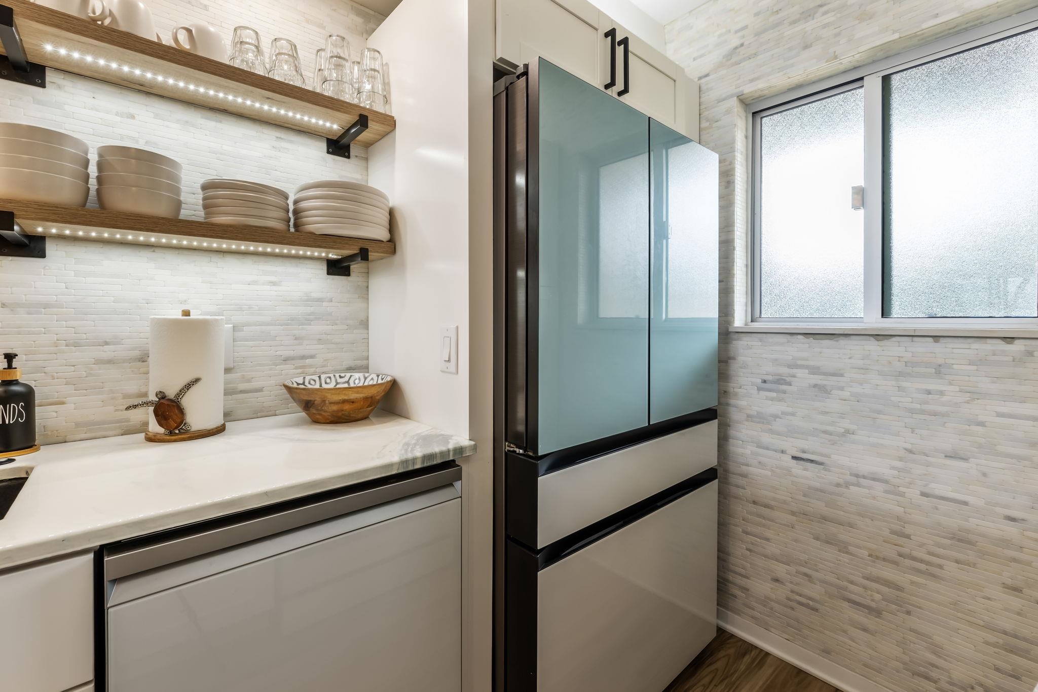 760 South Kihei Road, Unit 208 Kihei, HI 96753 - Photo 4 of 30 a kitchen with a refrigerator and a sink
