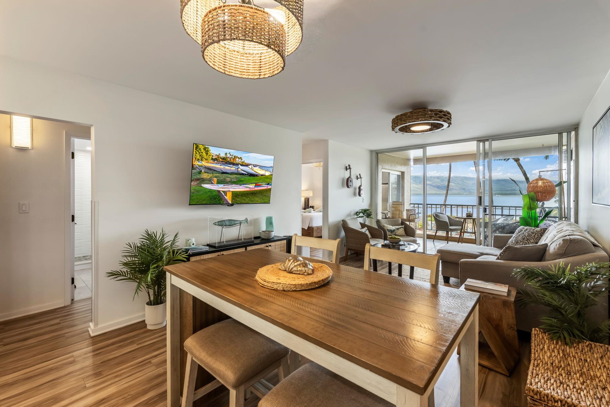 760 South Kihei Road, Unit 208 Kihei, HI 96753 - Photo 8 of 30 a view of a dining room with furniture window and wooden floor