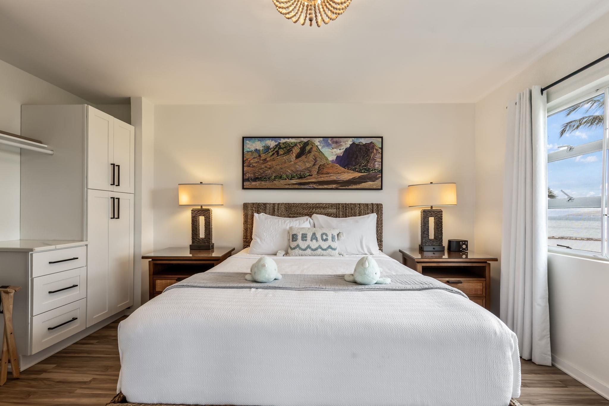 760 South Kihei Road, Unit 208 Kihei, HI 96753 - Photo 10 of 30 a bedroom with a bed and a painting on the wall