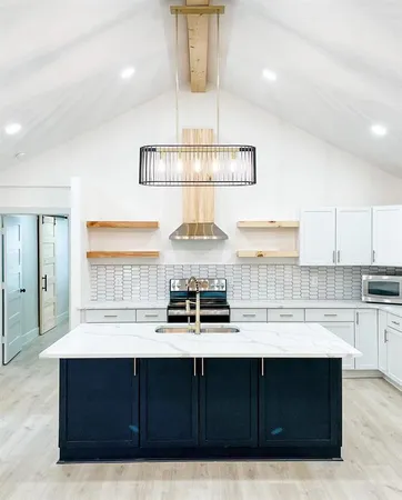 a kitchen with a cabinets and window