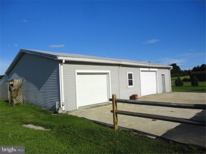46 Telegraph Road Bridgeton, NJ 08302 - Photo 22 of 24 a front view of a house with a yard