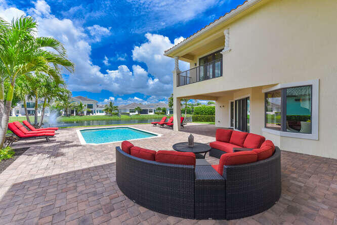 6950 Northwest 26th Way Boca Raton, FL 33496 - Photo 11 of 16 a view of yard with outdoor seating
