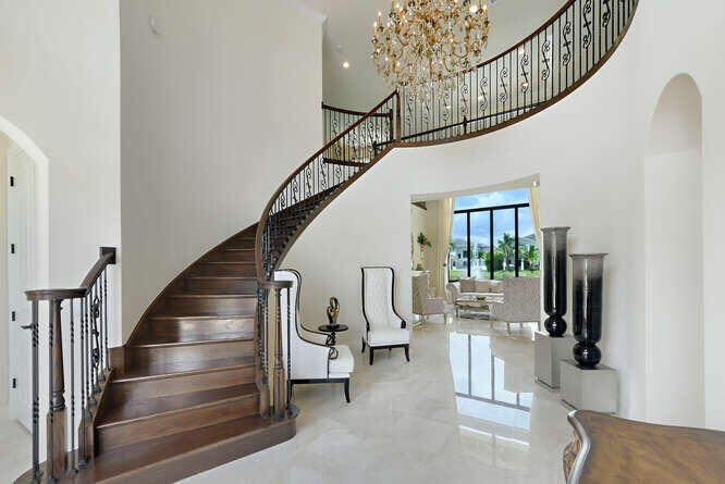 6950 Northwest 26th Way Boca Raton, FL 33496 - Photo 2 of 16 a view of entryway and hall