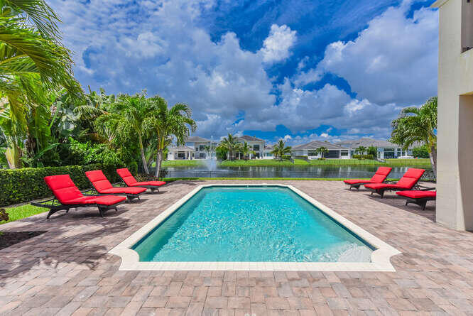 6950 Northwest 26th Way Boca Raton, FL 33496 - Photo 9 of 16 a view of outdoor space yard and swimming pool