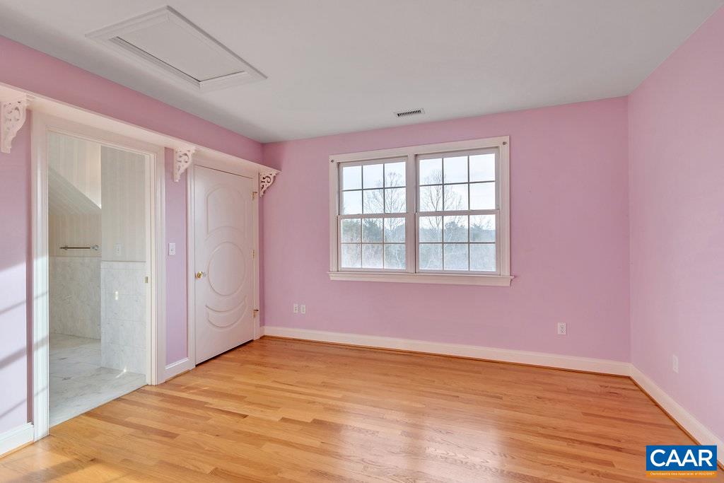 4460 Ivy Road Charlottesville, VA 22903 - Photo 19 of 26 Accessed via a private staircase, the two upstairs bedrooms share a large bathroom. Teens and guests will love this arrangement. This room is 13 x 13.