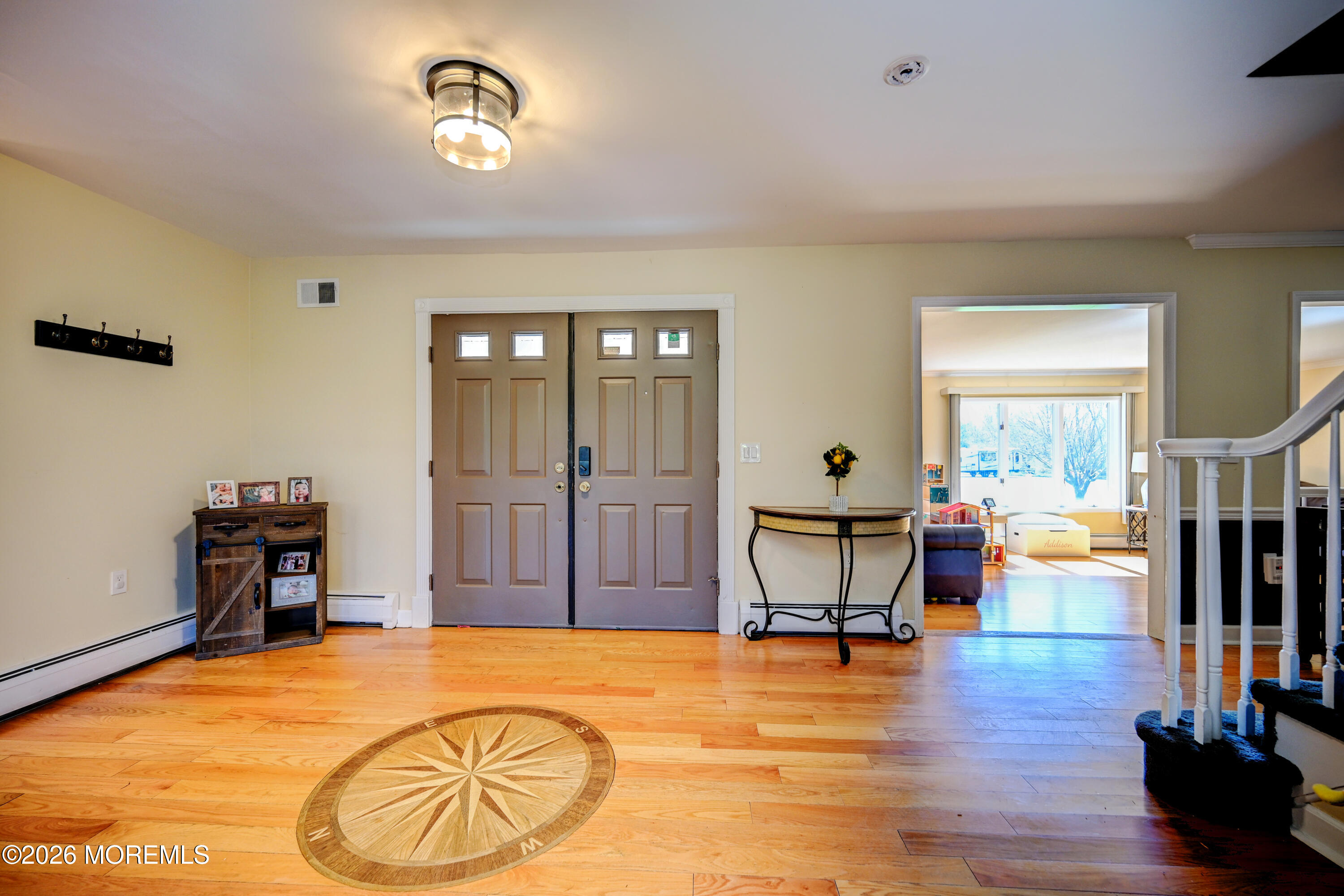 23 Red Hawk Road South Colts Neck, NJ 07722 - Photo 3 of 70 03-Entrance Foyer to Living Room
