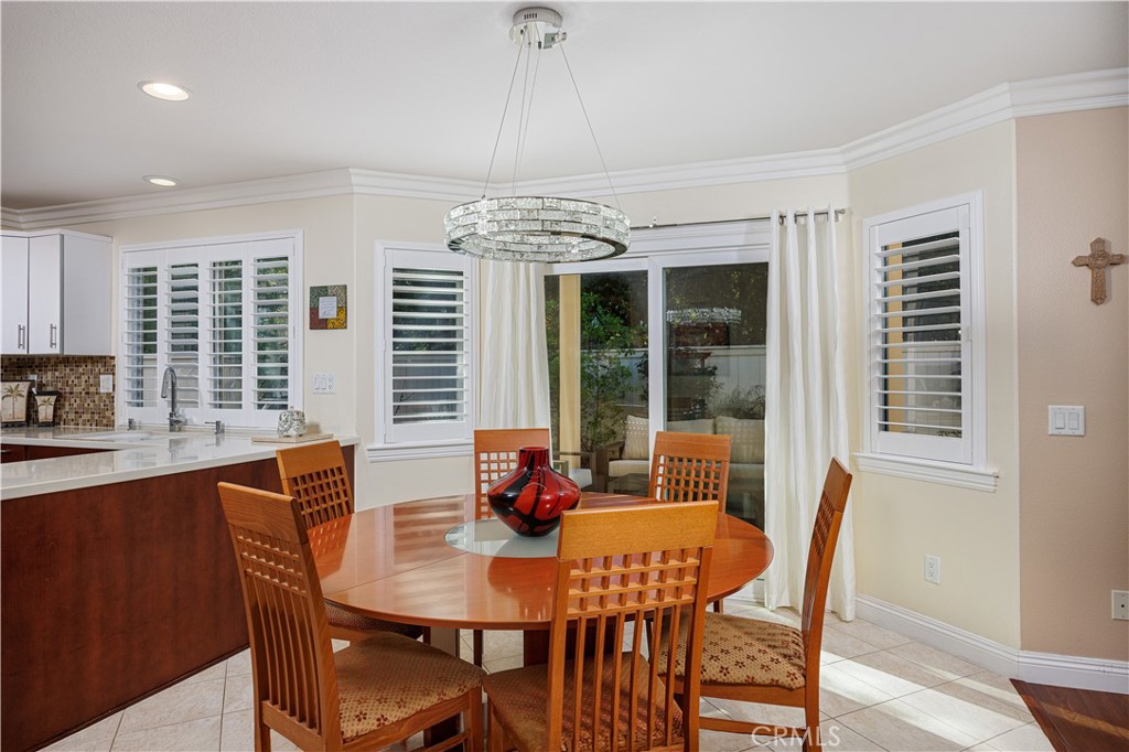 14 Sorenson Irvine, CA 92602 - Photo 11 of 29 a view of a dining room with furniture window and outside view
