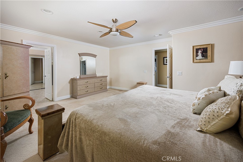 14 Sorenson Irvine, CA 92602 - Photo 16 of 27 a bedroom with a bed and wooden floor