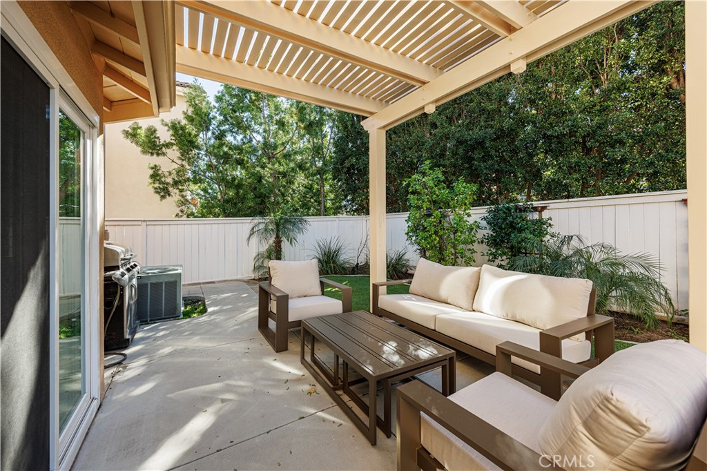 14 Sorenson Irvine, CA 92602 - Photo 26 of 29 a view of a patio with couches table and chairs and potted plants