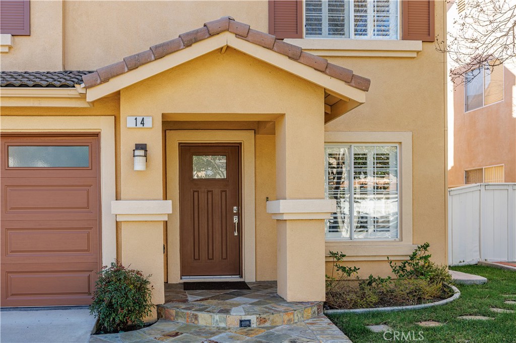 14 Sorenson Irvine, CA 92602 - Photo 3 of 27 a front view of a house with a yard
