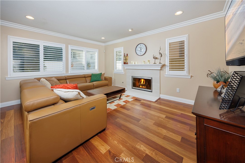 14 Sorenson Irvine, CA 92602 - Photo 6 of 27 a living room with furniture and a fireplace