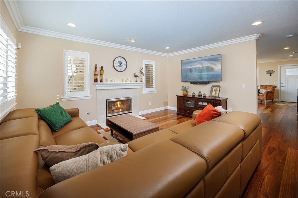 14 Sorenson Irvine, CA 92602 - Photo 8 of 29 a living room with furniture and a fireplace
