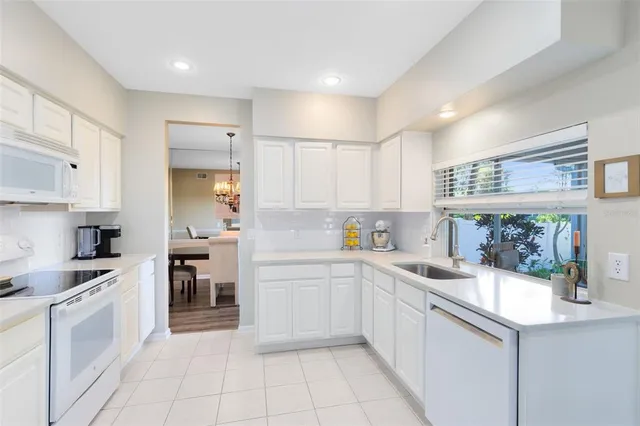 a kitchen with a sink cabinets and counter space