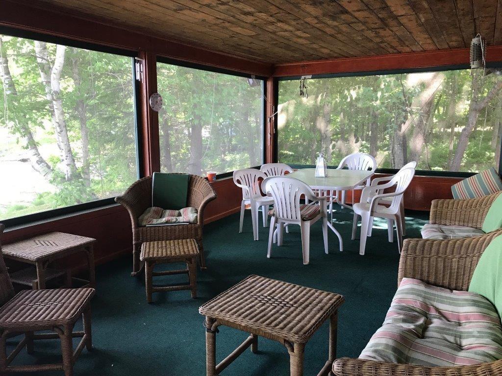 69 41st Fire Road South China, ME 04358 - Photo 8 of 29 SCREENED PORCH