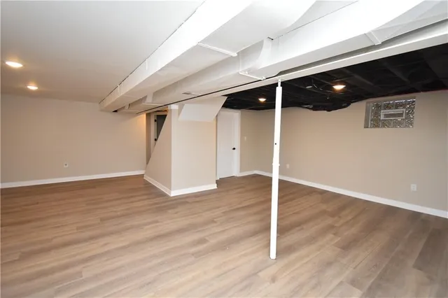 a view of a livingroom with wooden floor