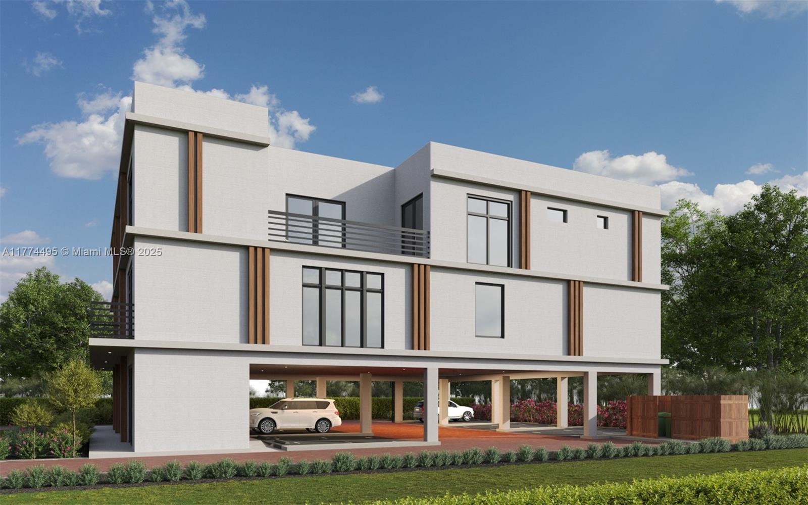 630 Northeast 3rd Street Hallandale Beach, FL 33009 - Photo 4 of 13 a view of front of house with a yard