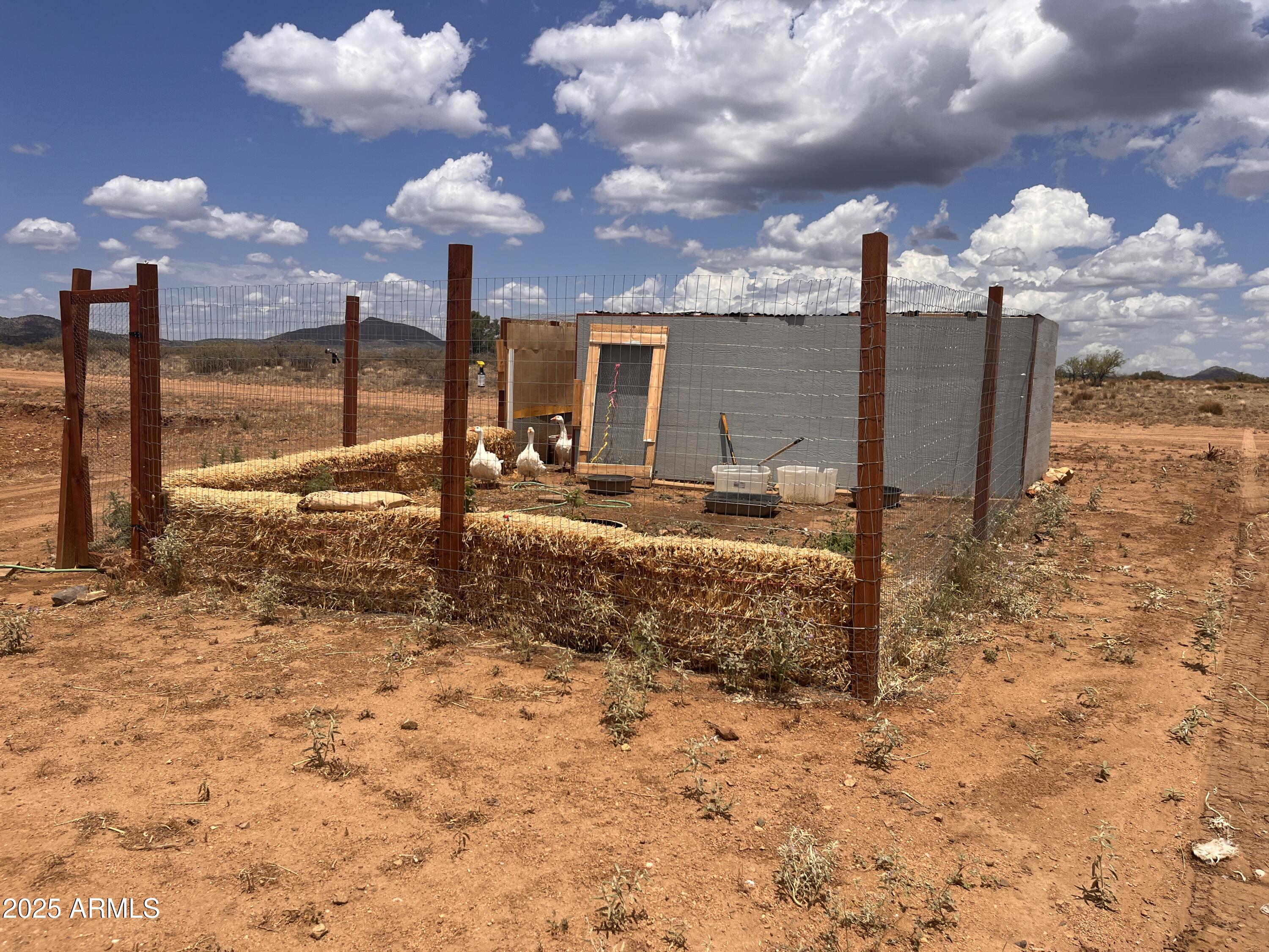 1100 South Iron Springs Road Skull Valley, AZ 86338 - Photo 12 of 22 a view of a backyard with a stove