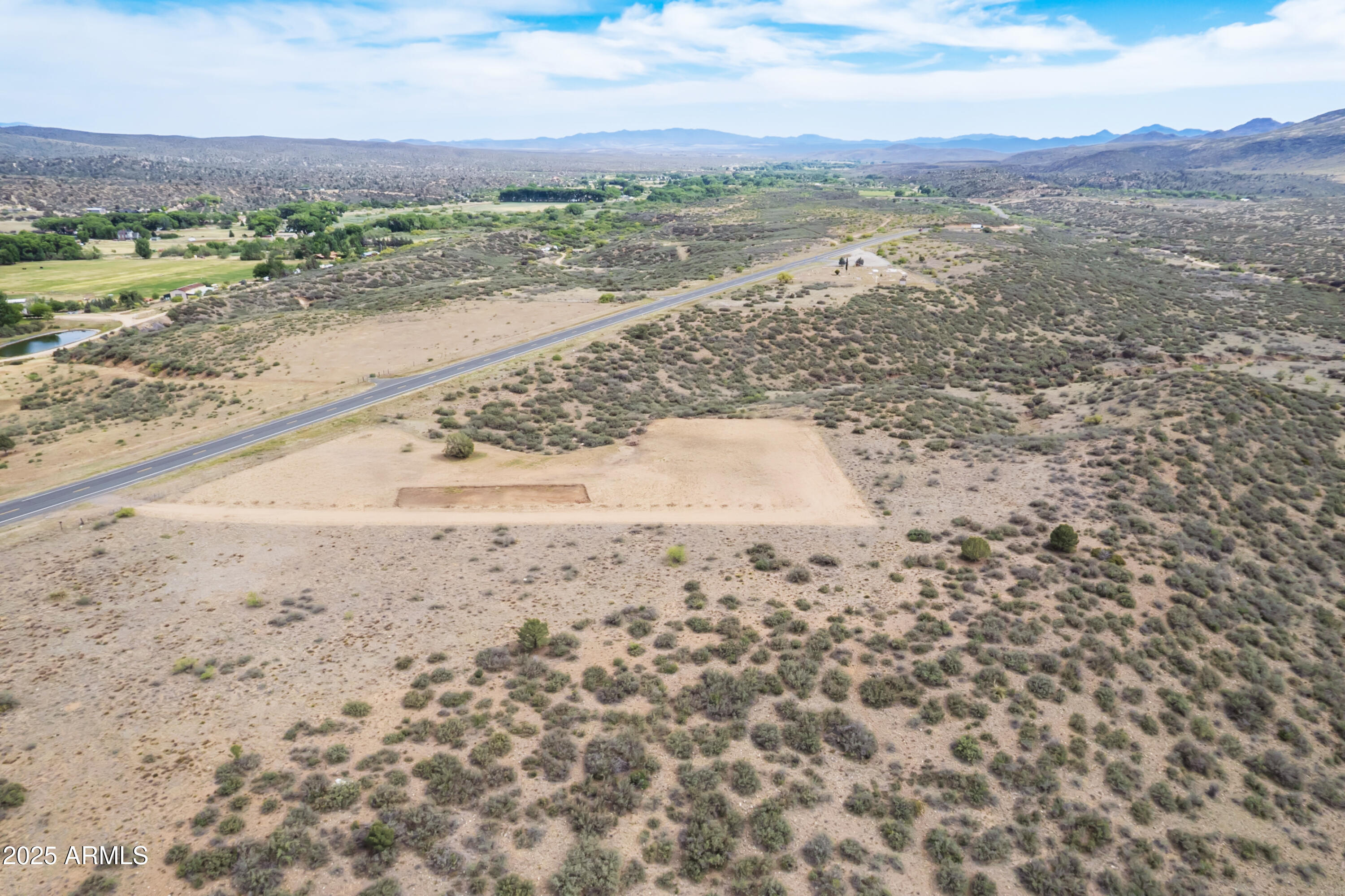 1100 South Iron Springs Road Skull Valley, AZ 86338 - Photo 3 of 22 a view of an ocean beach and mountain