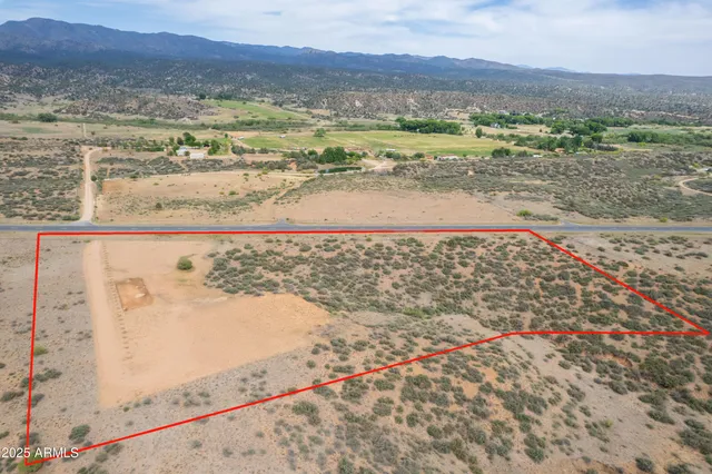 a view of an ocean and a mountain view