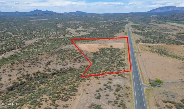 a view of a road with a mountain