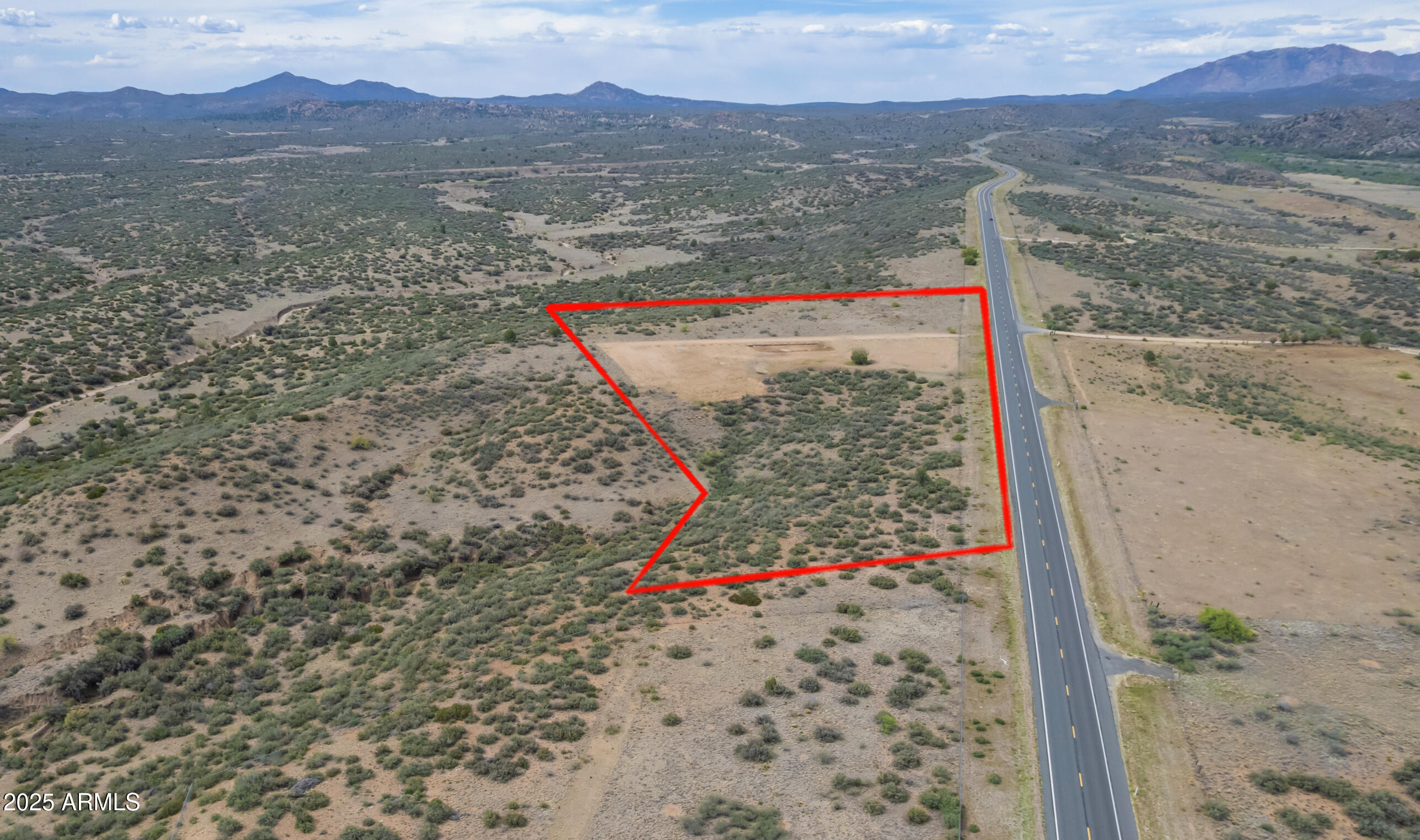 1100 South Iron Springs Road Skull Valley, AZ 86338 - Photo 6 of 22 a view of a road with a mountain