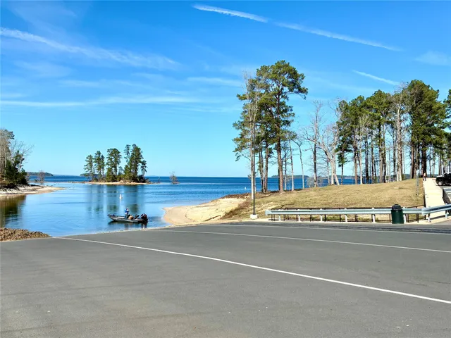 a view of a swimming pool with an outdoor space and seating area