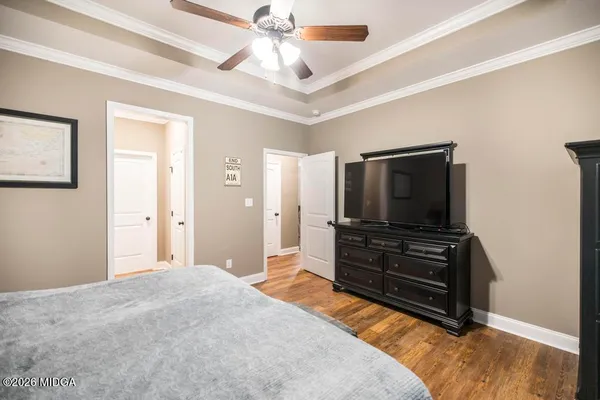 a bathroom with a sink toilet a shower and a mirror