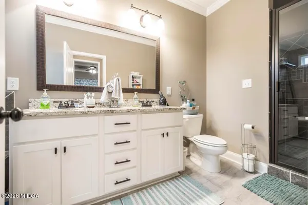 a bathroom with a bathtub and window