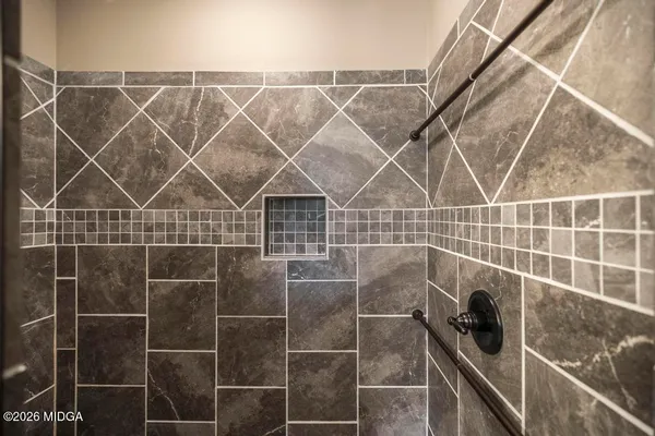 a room with furniture and a fireplace