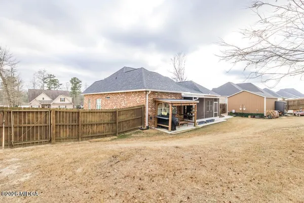 a house view with a outdoor space