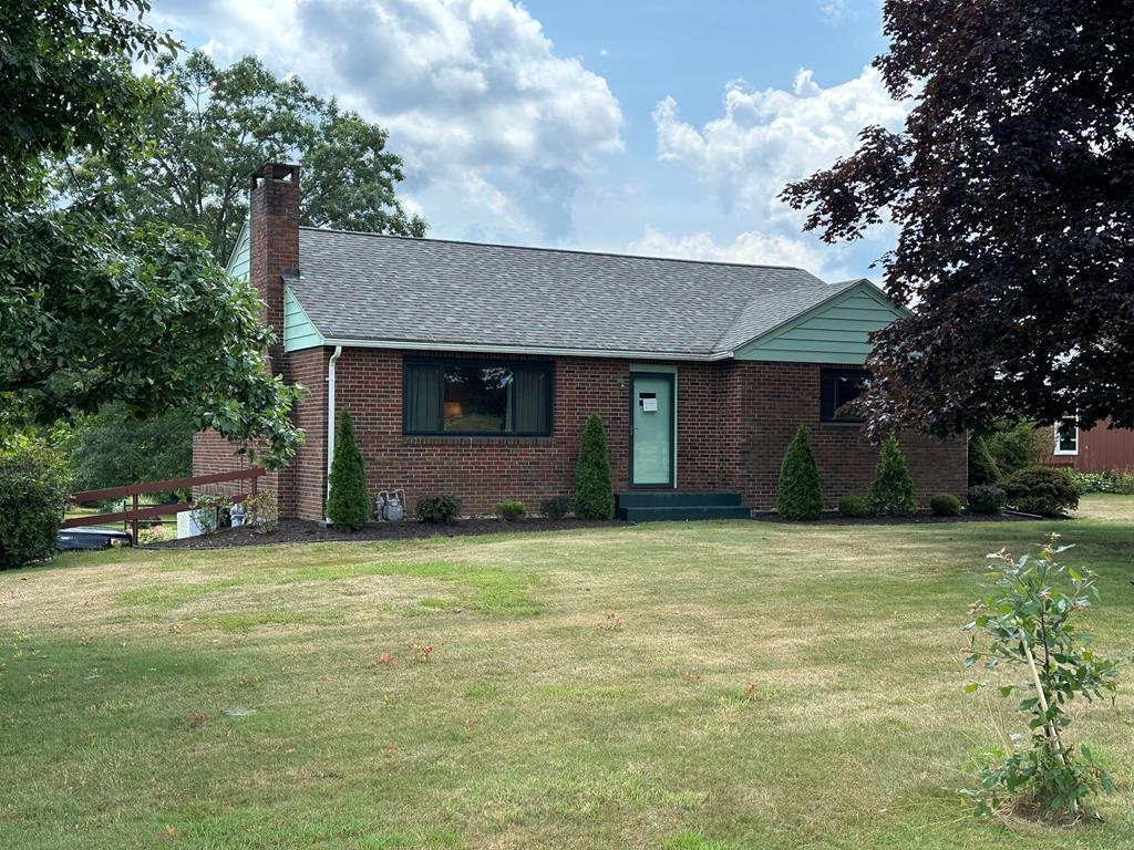 1525 Pittsburgh Road Franklin, PA 16323 - Photo 1 of 31 a house view with a sitting space and garden