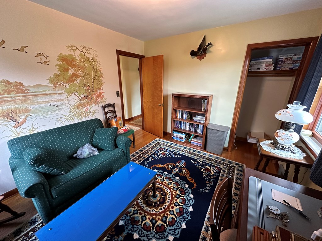 1525 Pittsburgh Road Franklin, PA 16323 - Photo 15 of 31 a bedroom with furniture and a wooden floor