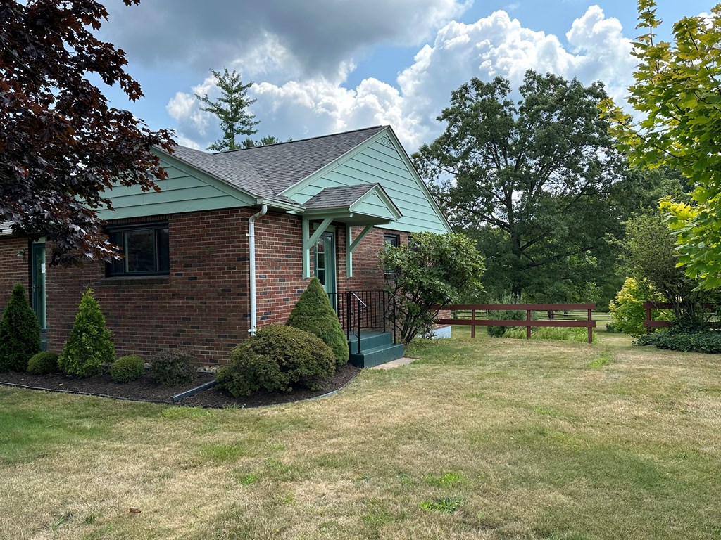 1525 Pittsburgh Road Franklin, PA 16323 - Photo 5 of 31 a view of a backyard with a garden