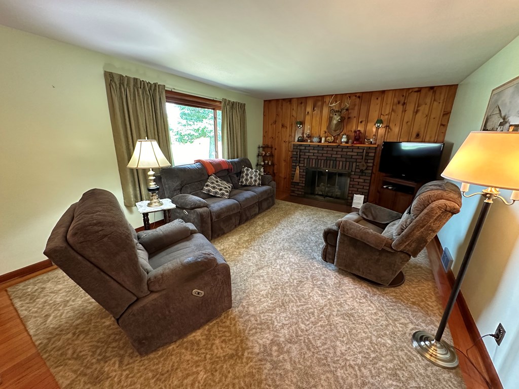 1525 Pittsburgh Road Franklin, PA 16323 - Photo 8 of 31 a living room with furniture and a flat screen tv