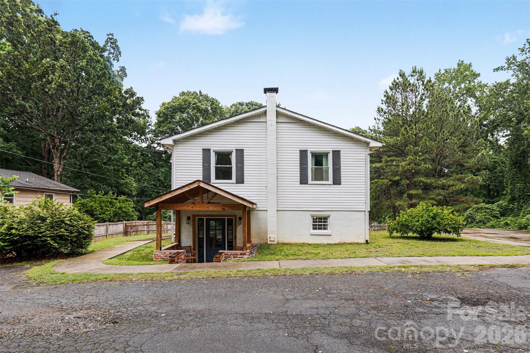 184 Canal Road Belmont, NC 28012 - Photo 2 of 39 a house view with a outdoor space