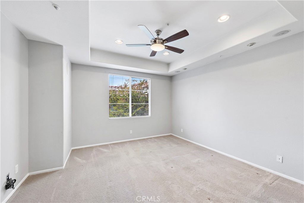 158 North Brea Boulevard Brea, CA 92821 - Photo 15 of 22 an empty room with fan and windows