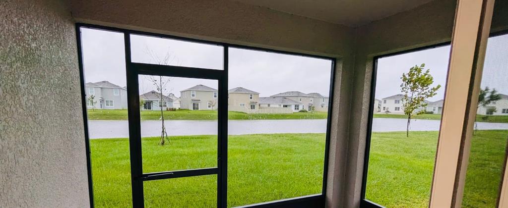 8954 Forge Breeze Loop Wesley Chapel, FL 33545 - Photo 20 of 37 a view of an outdoor from a window