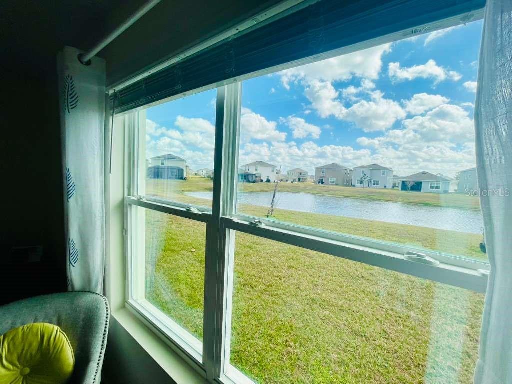 8954 Forge Breeze Loop Wesley Chapel, FL 33545 - Photo 31 of 37 a view of sky from window