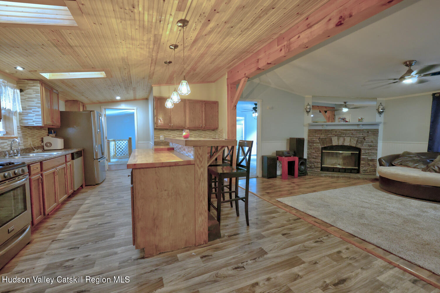 141 Jones Road Round Top, NY 12473 - Photo 12 of 70 a living room with furniture and a fireplace