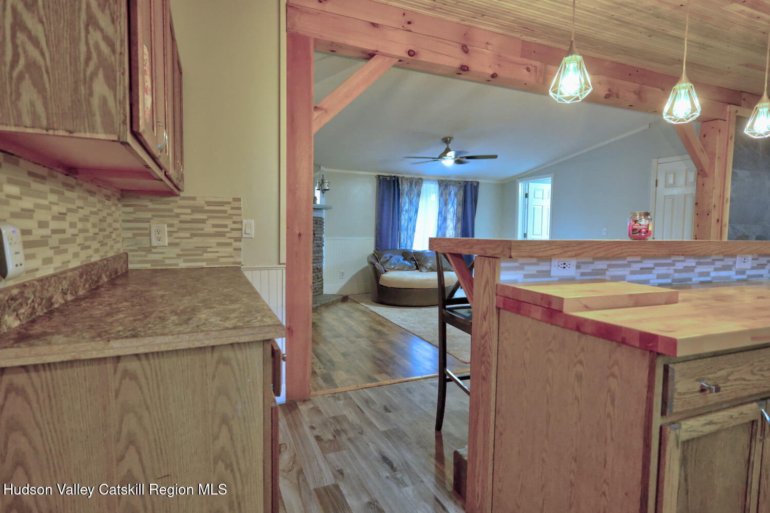 141 Jones Road Round Top, NY 12473 - Photo 16 of 70 a view of kitchen and hall with wooden floor