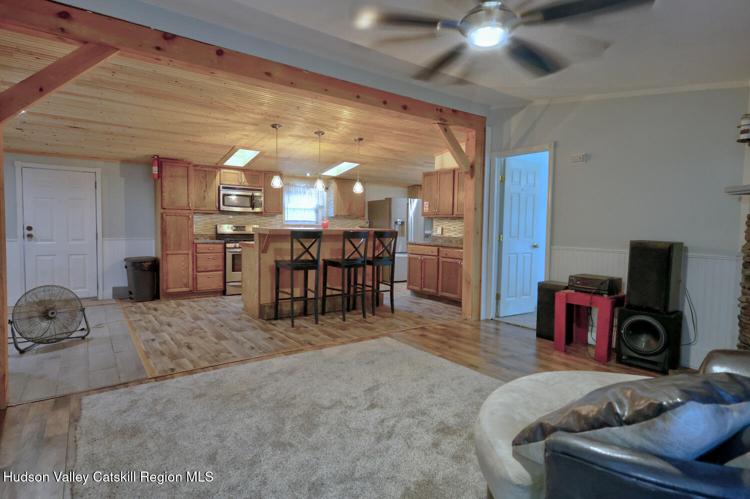 141 Jones Road Round Top, NY 12473 - Photo 19 of 70 a view of a livingroom with furniture and a flat screen tv
