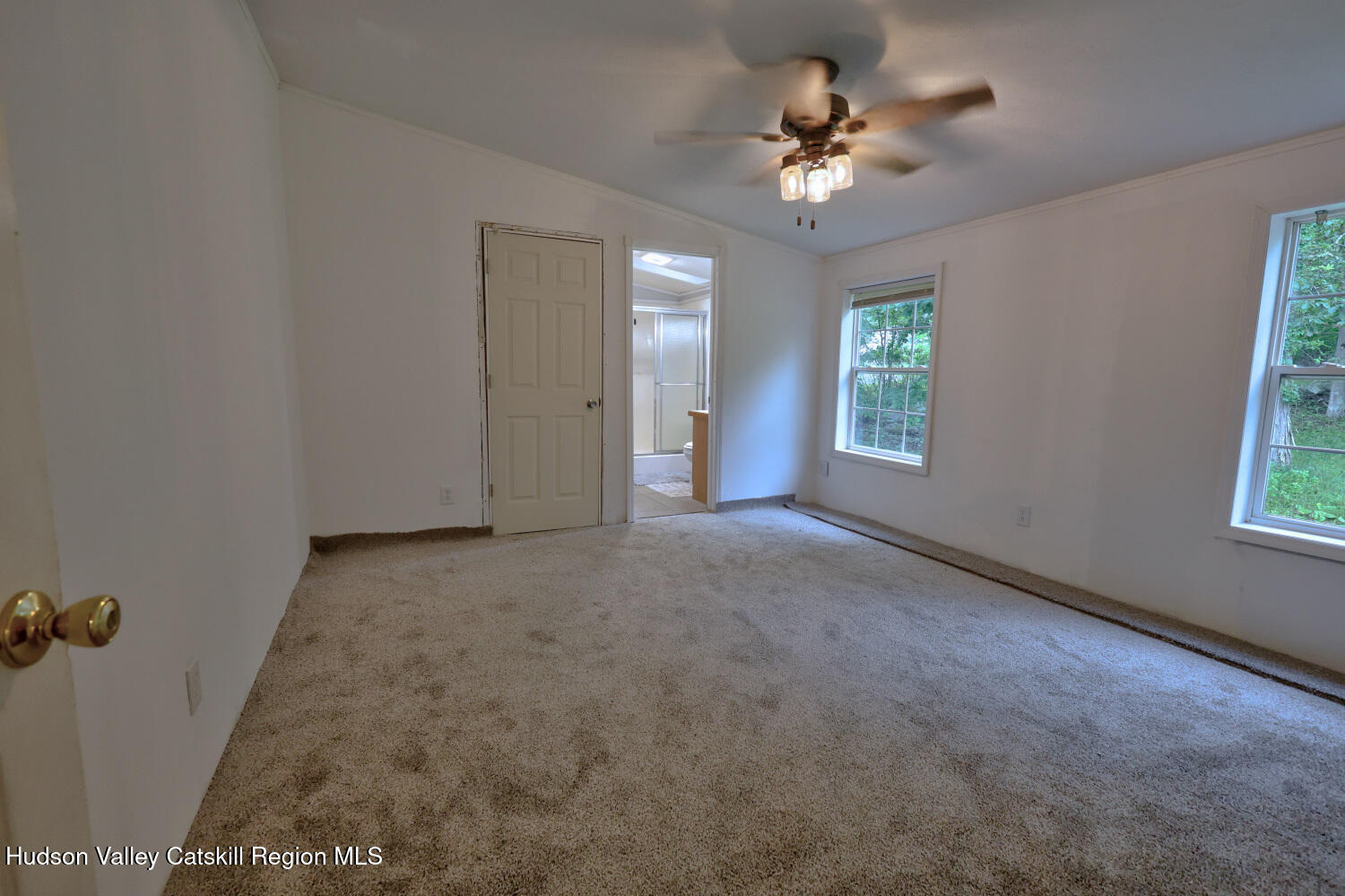 141 Jones Road Round Top, NY 12473 - Photo 38 of 70 a view of a room with a ceiling fan and window