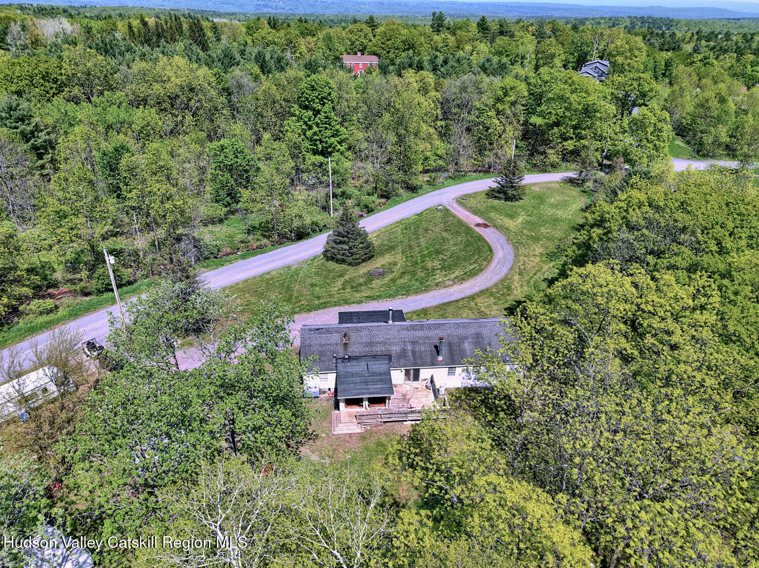 141 Jones Road Round Top, NY 12473 - Photo 5 of 70 an aerial view of a house with a yard and outdoor seating