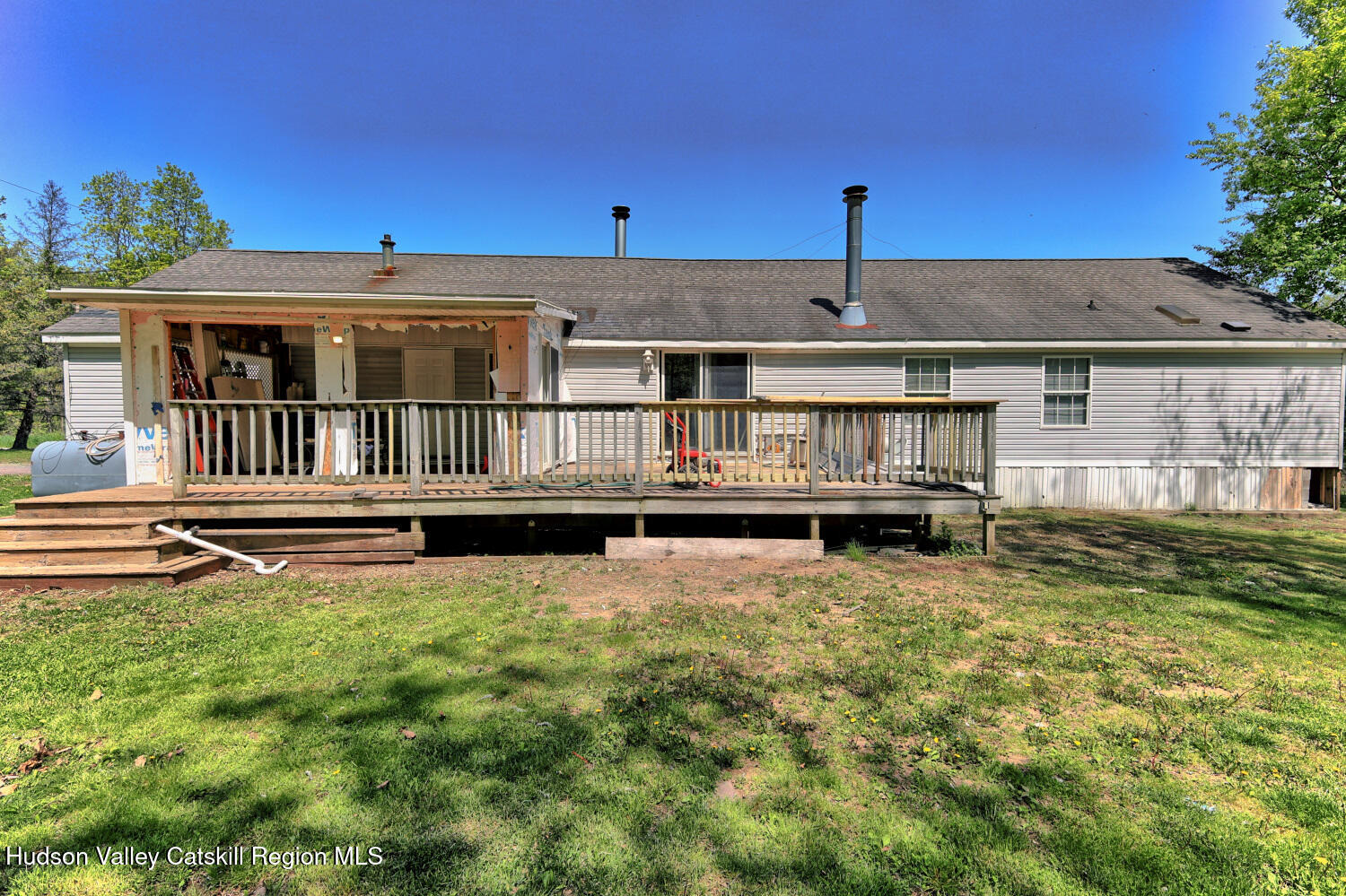141 Jones Road Round Top, NY 12473 - Photo 52 of 70 a view of a house with a small yard