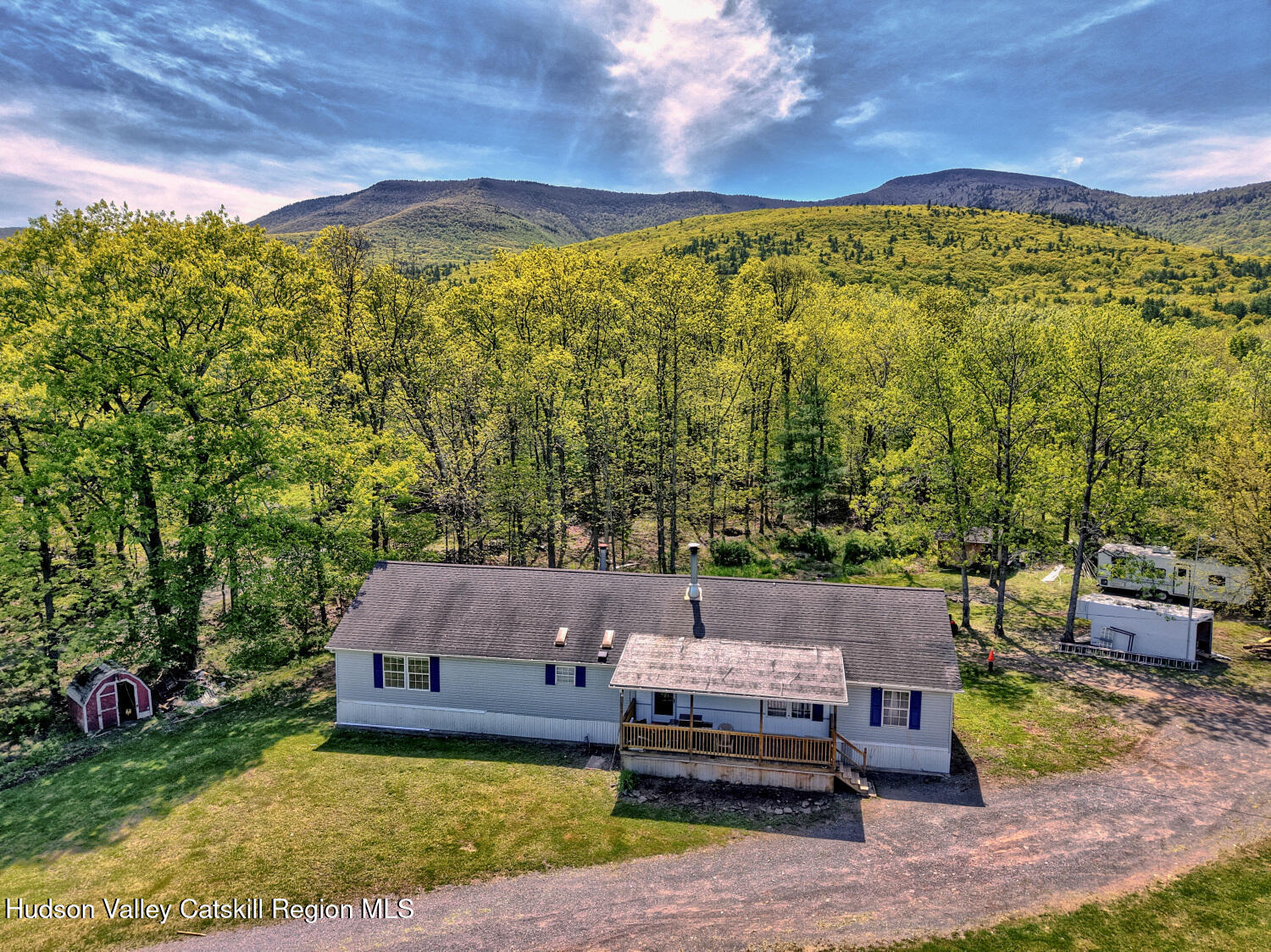 141 Jones Road Round Top, NY 12473 - Photo 56 of 70 a view of a terrace with a garden and sitting area