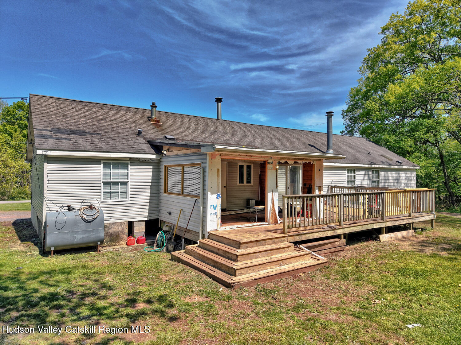 141 Jones Road Round Top, NY 12473 - Photo 10 of 70 a view of a house with backyard and sitting area