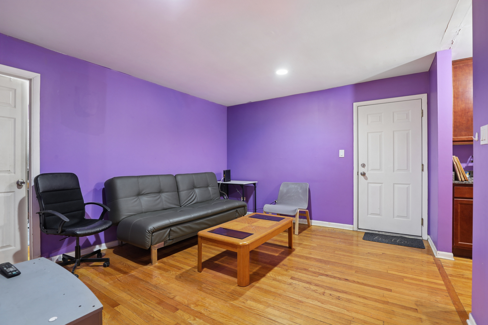 2147 Ridge Avenue, Unit 2D Evanston, IL 60201 - Photo 3 of 22 a living room with furniture a flat screen tv and rug