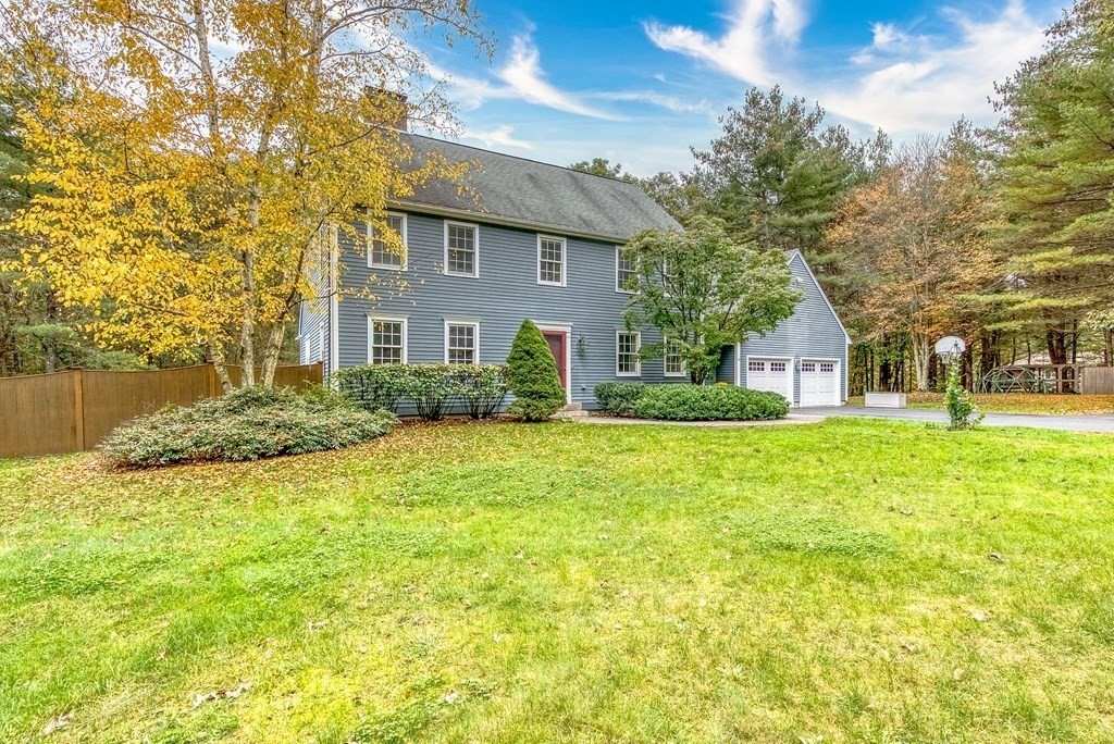 41 South Street Upton, MA 01568 - Photo 1 of 41 a front view of a house with garden