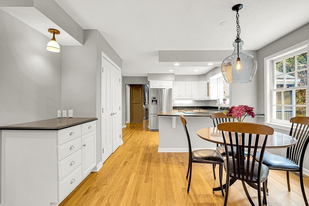 41 South Street Upton, MA 01568 - Photo 12 of 41 a view of a dining room with furniture and a chandelier