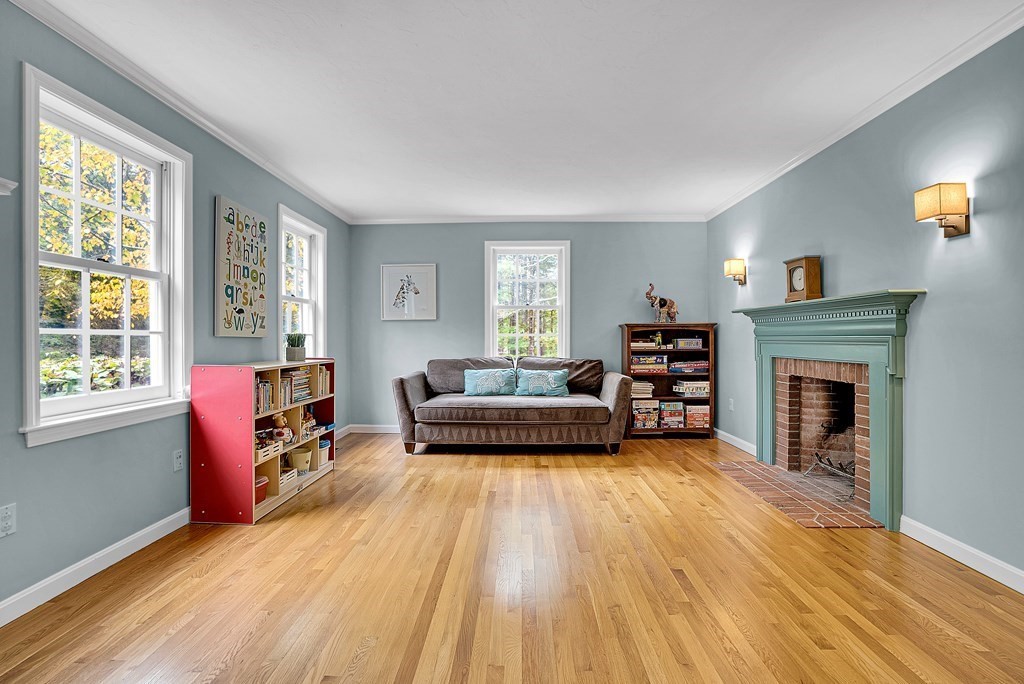 41 South Street Upton, MA 01568 - Photo 14 of 41 a living room with furniture and a fireplace